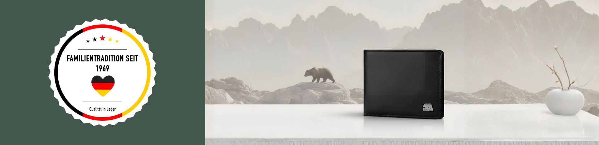 Schwarze Leder Geldbörse von BROWN BEAR auf heller Fläche, im Hintergrund Gebirgslandschaft mit Bär und Qualitätssiegel